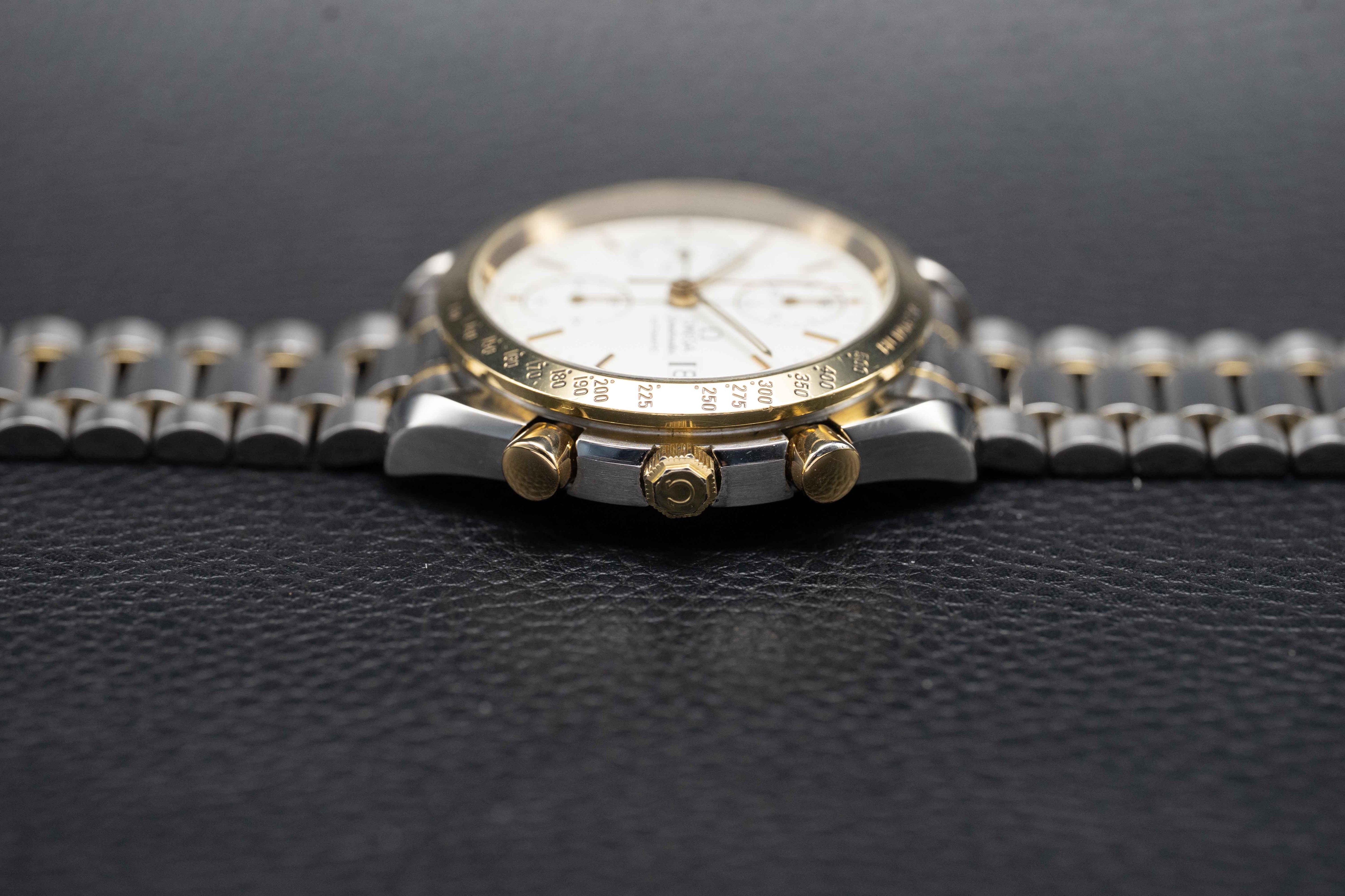 Omega Speedmaster Date 3311.20 Steel/Gold 1999 Papers