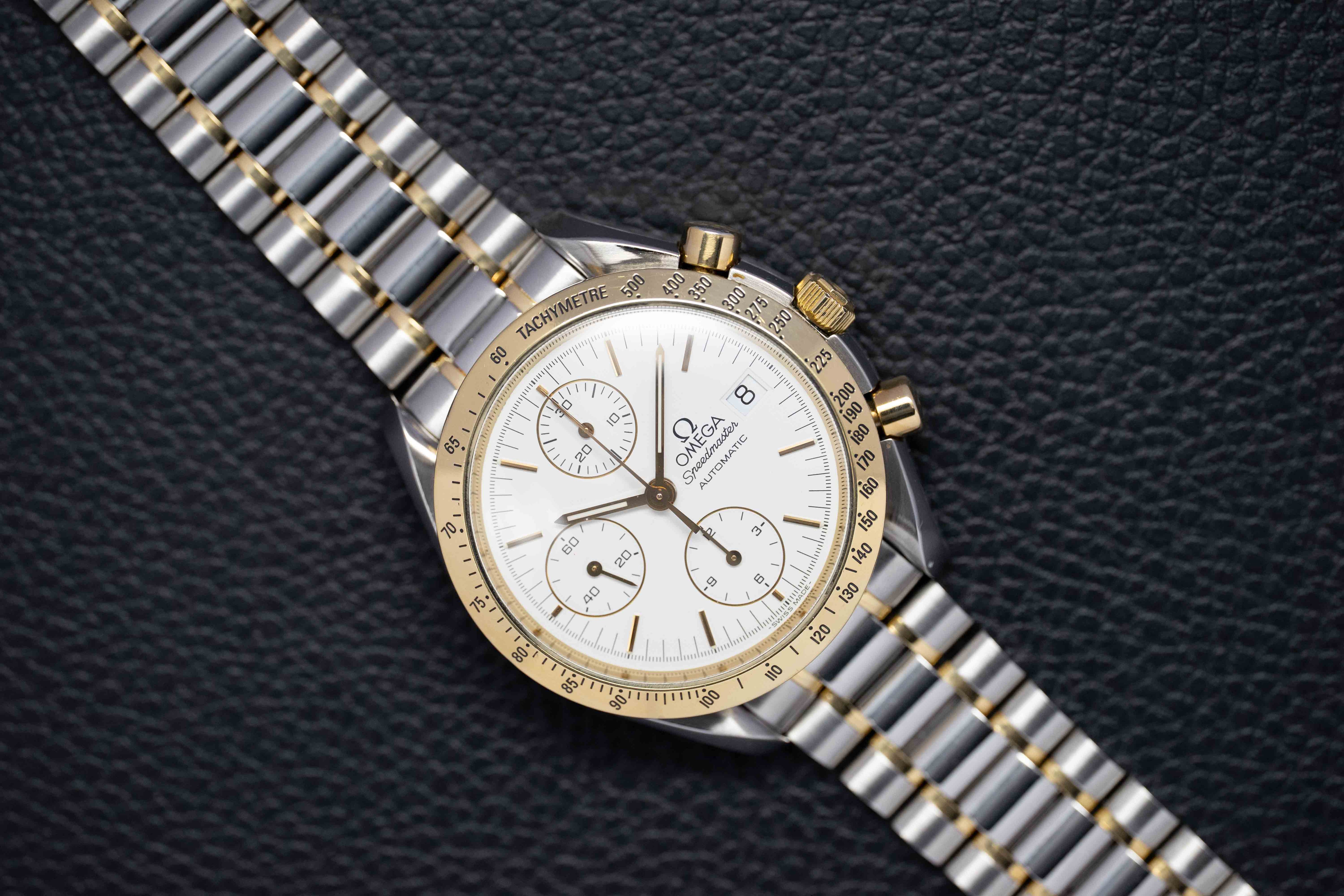 Omega Speedmaster Date 3311.20 Steel/Gold 1999 Papers