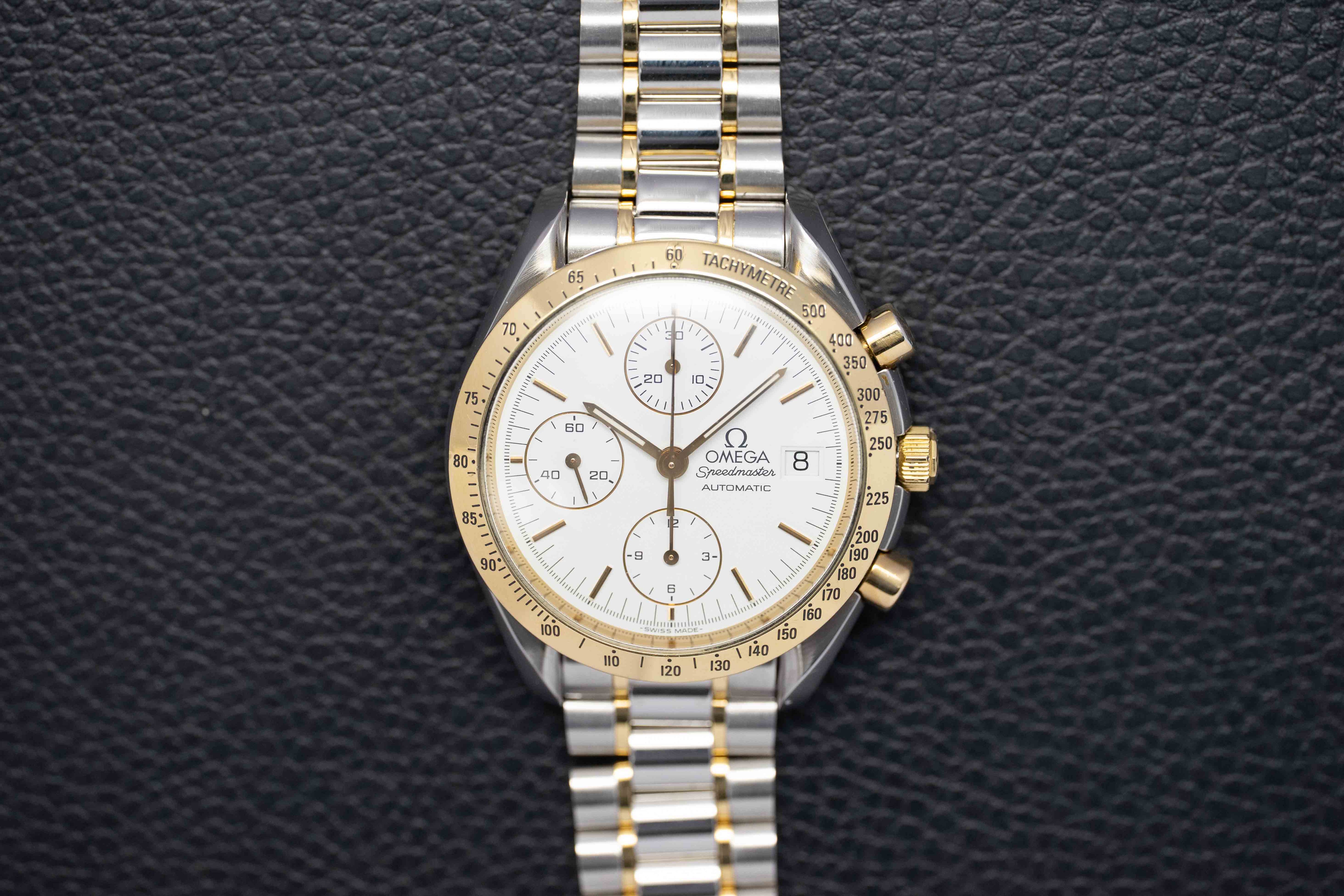 Omega Speedmaster Date 3311.20 Steel/Gold 1999 Papers