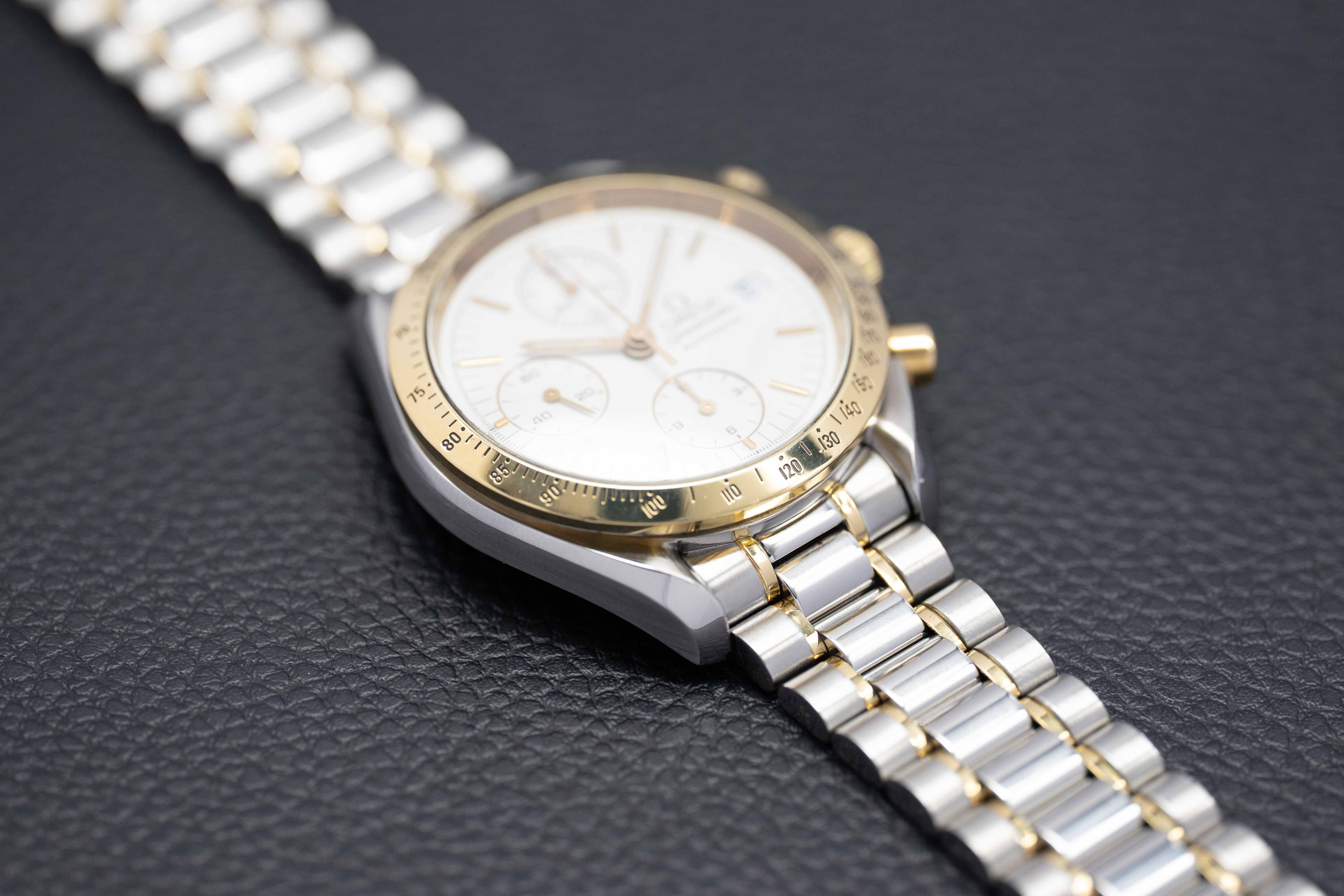 Omega Speedmaster Date 3311.20 Steel/Gold 1999 Papers