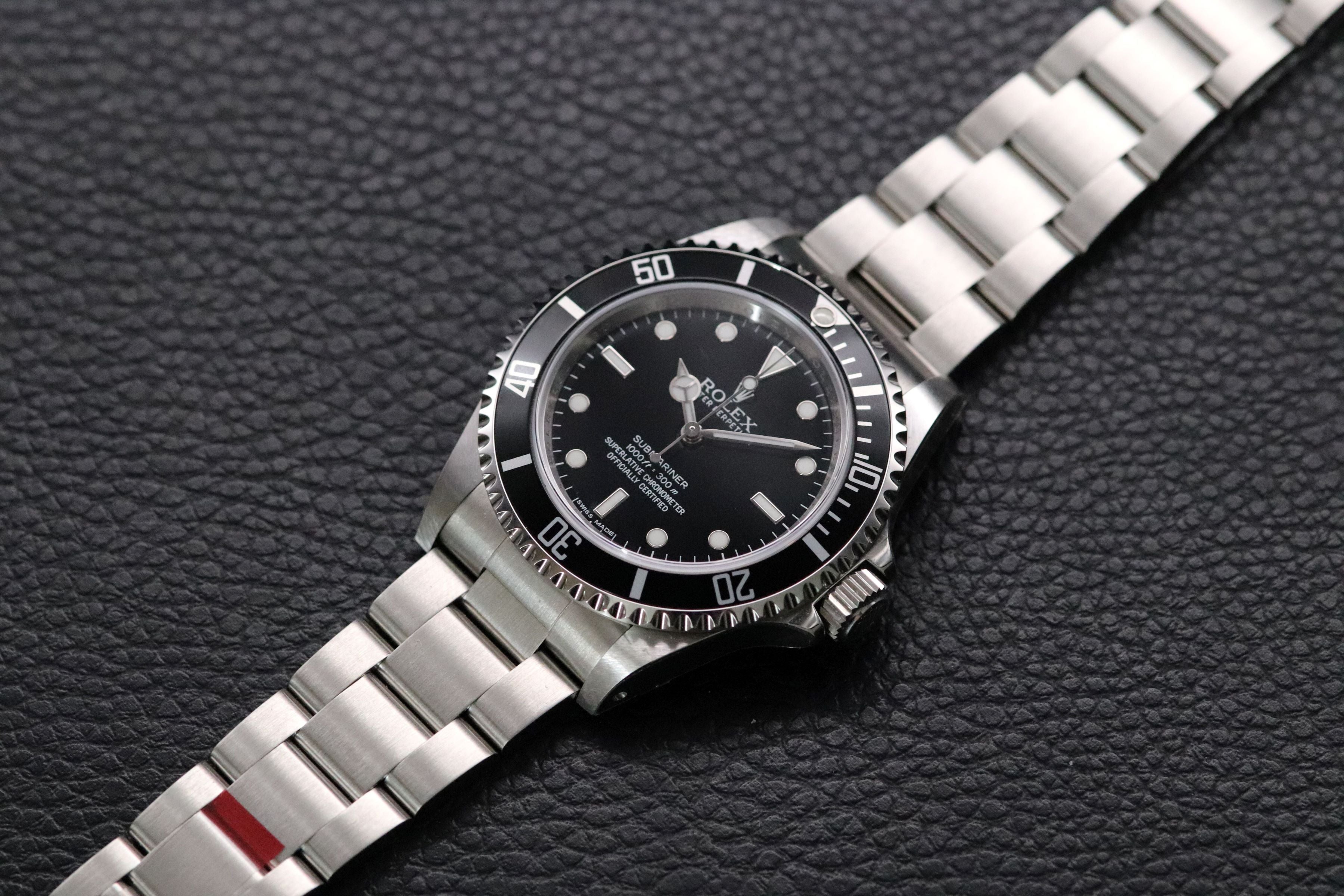 Rolex Submariner 14060M NOS Four-Liner