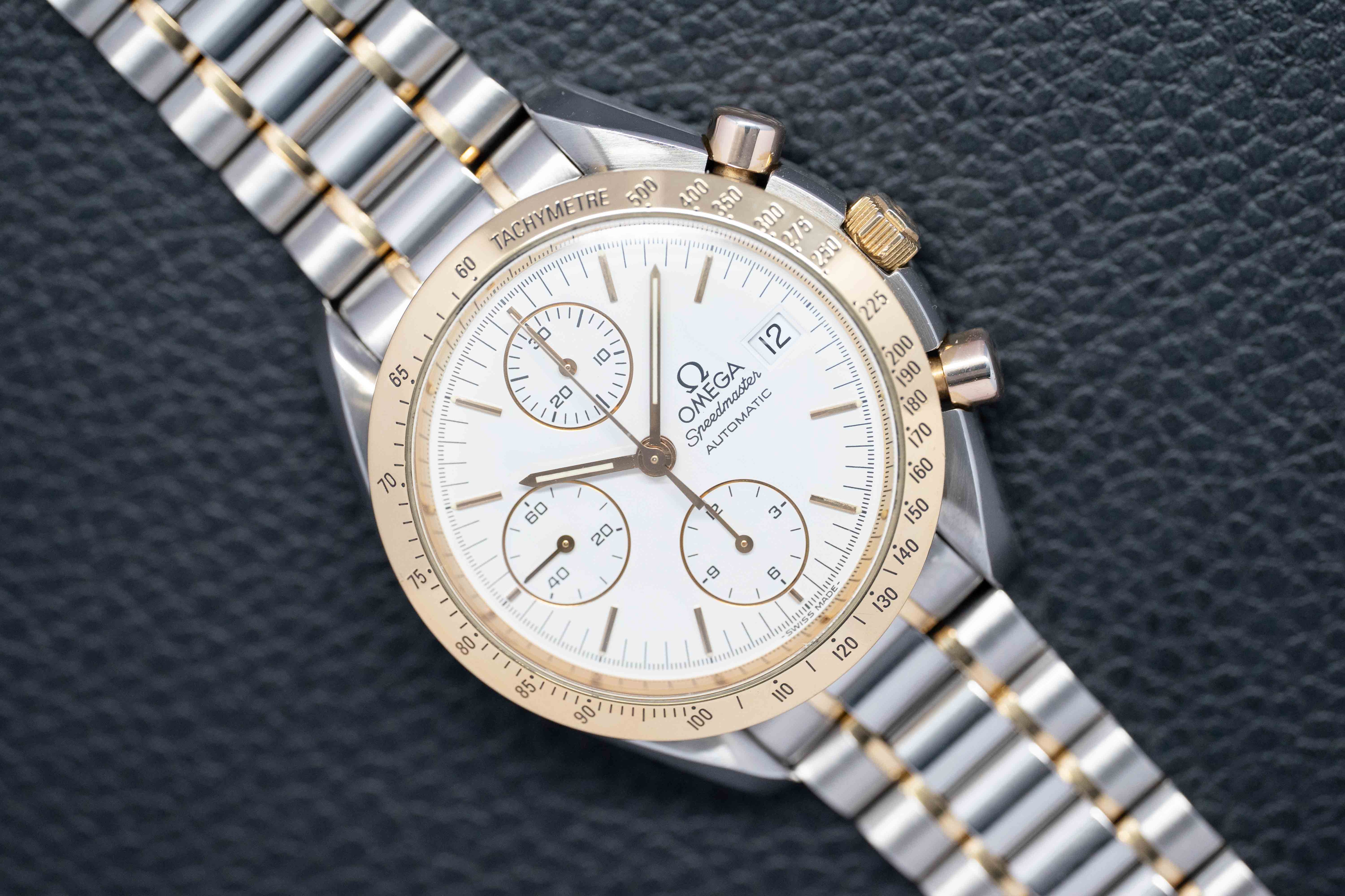 Omega Speedmaster Date 3311.20 Steel/Gold 1995