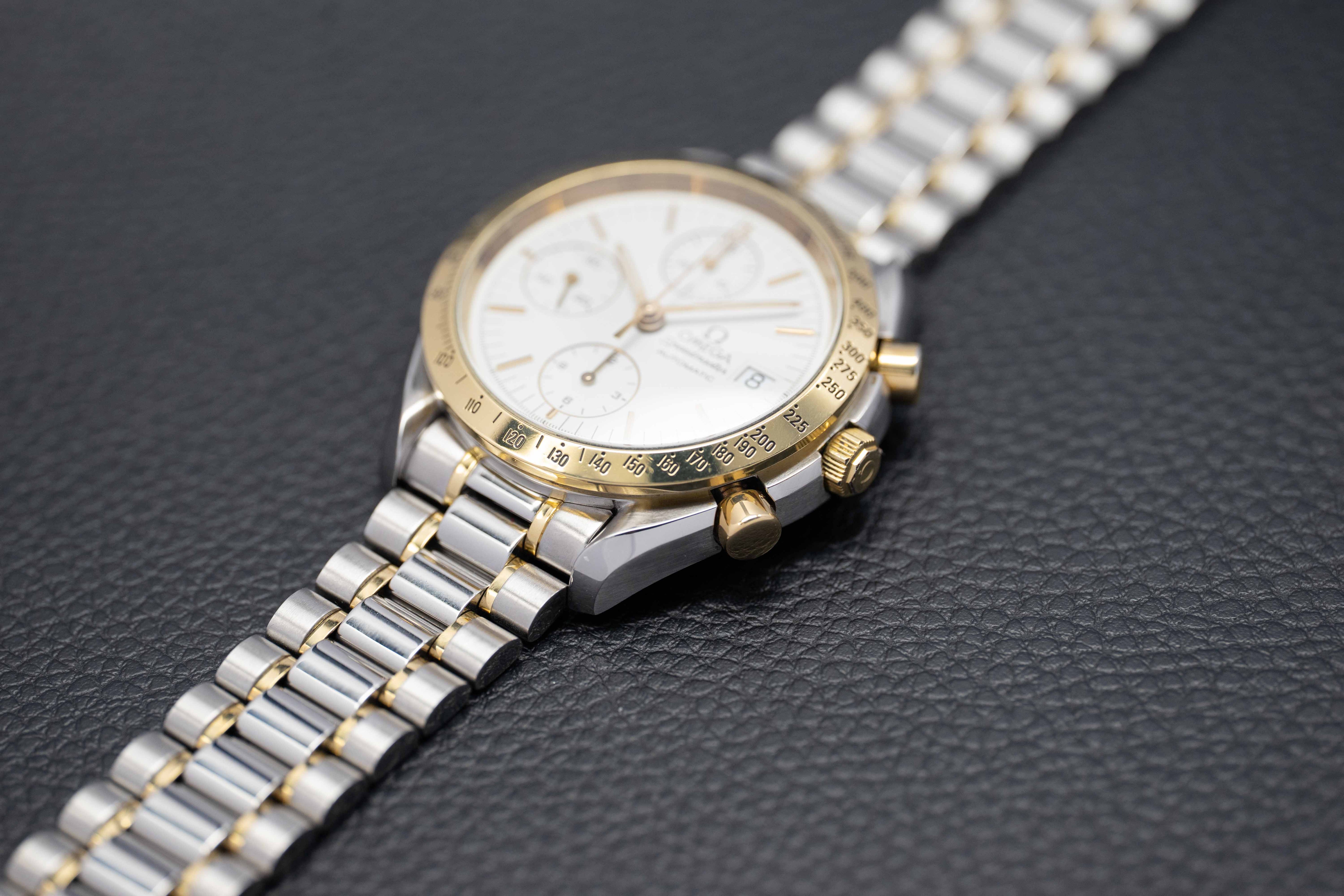 Omega Speedmaster Date 3311.20 Steel/Gold 1999 Papers