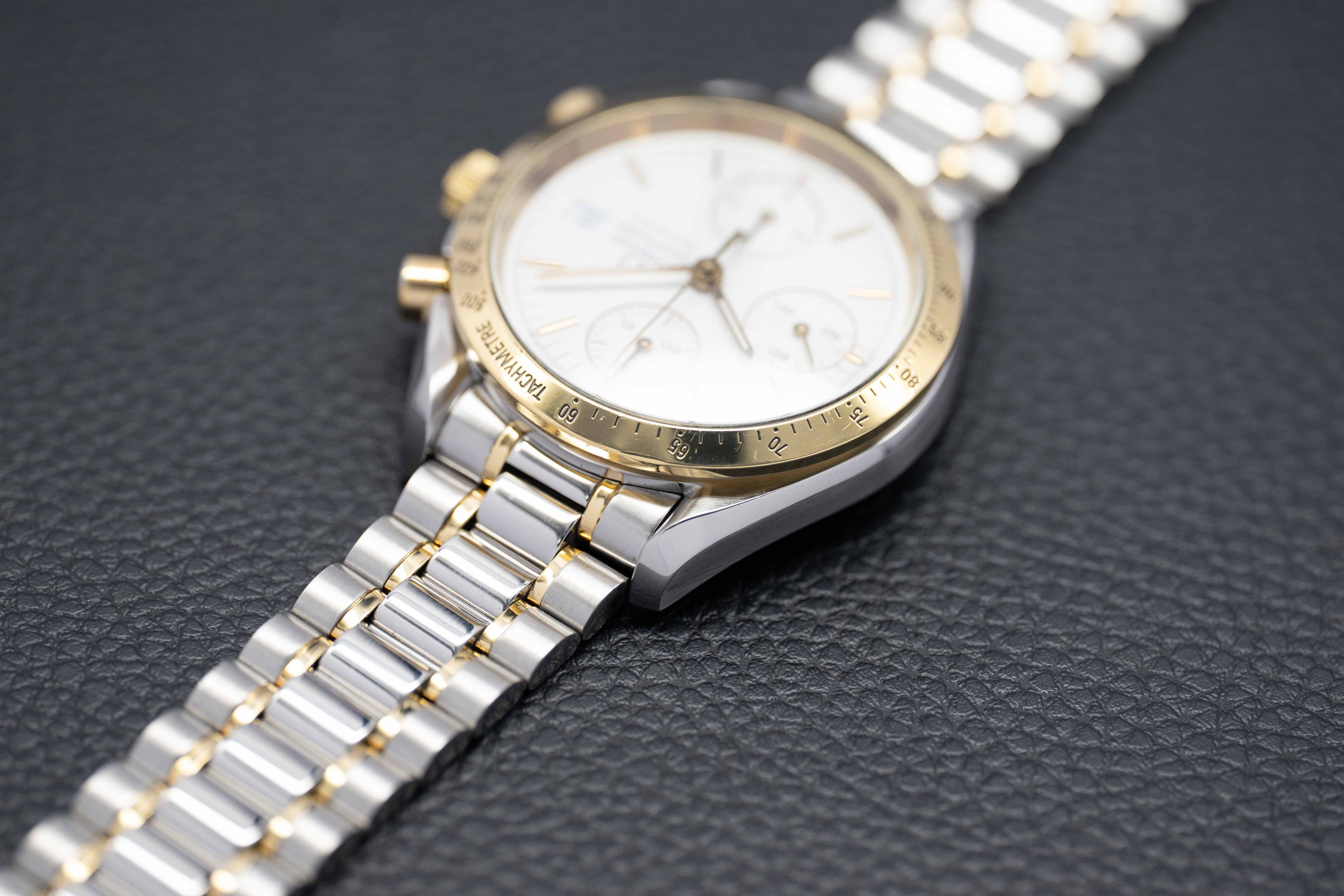 Omega Speedmaster Date 3311.20 Steel/Gold 1999 Papers
