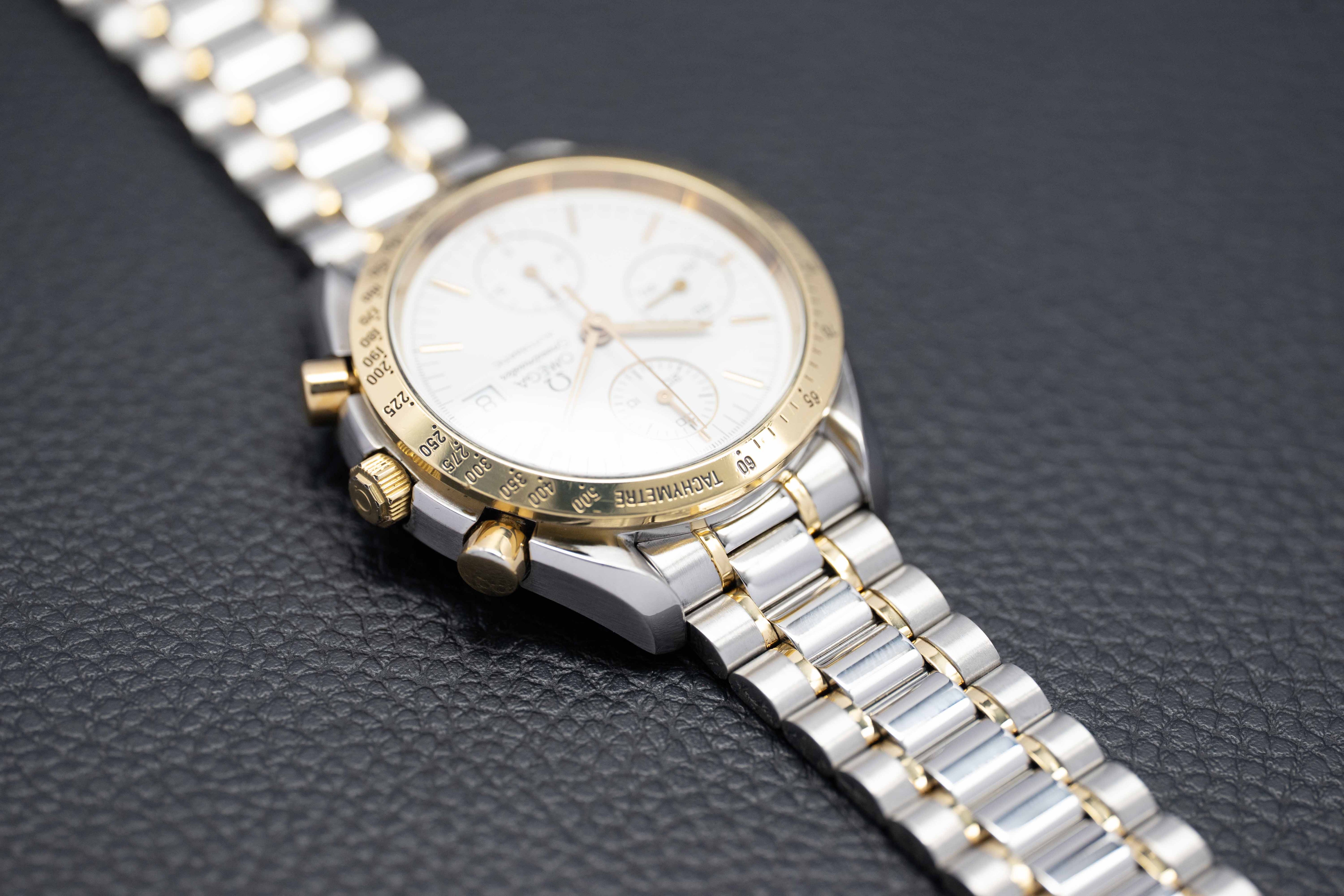 Omega Speedmaster Date 3311.20 Steel/Gold 1999 Papers