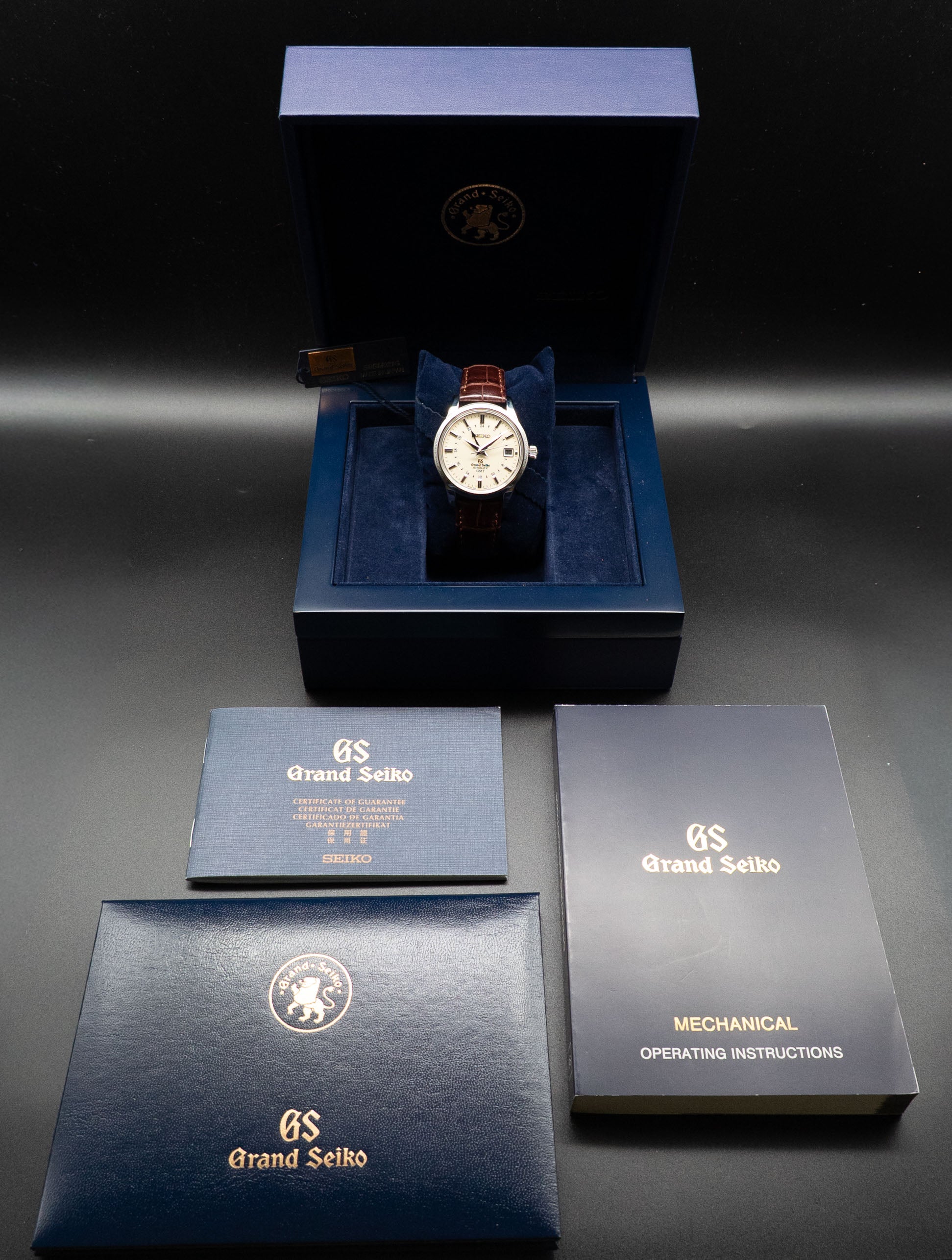 Grand Seiko Elegance Collection GMT SBGM021/9S66-00A0, FULLSET de 2013, caja y PAPERS